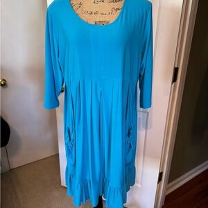 Bright Turquoise Scoop Neck Ruffle Hem Dress with Cute Tie Front Pockets!
